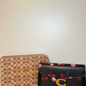 Coach Black Cherry Pattern Clutch